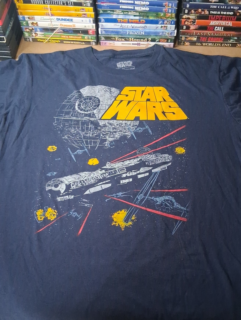 Star Wars Navy Blue Tee with Yellow Logo and Red Laser Graphics